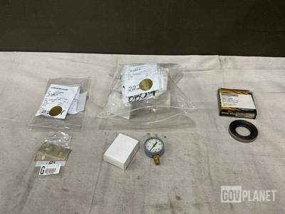 (21) Plain Encased Seals, (15) Pressure Gauges & Assorted Items
