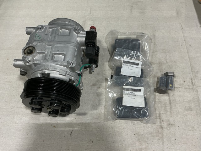 (1) Compressor, (95) Cushioning Pads, (16) Screws & Assorted Items