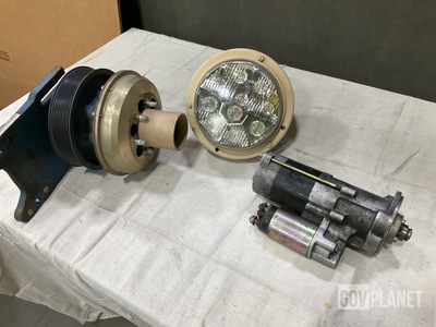 (1) Starter, (1) Engine Fan Clutch, (1) Headlight & Assorted Items