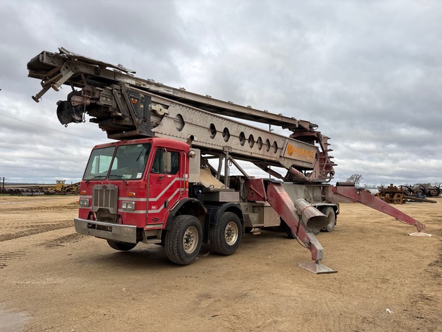 2013 Putzmeister TB110 on 2014 Peterbilt 320 10x4 Twin-Steer Concrete Conveyor Truck