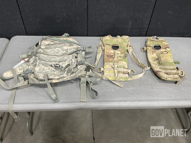 (11) Assault Packs, (85) Hydration System Carriers & Assorted Items