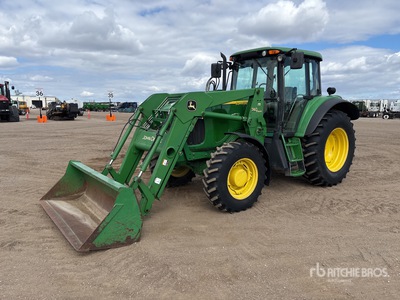 2003 John Deere 6715 جرار ذو دفع رباعي