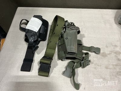 (6) Individual Holsters, (1) Pistol Holster Carrier & Assorted Items
