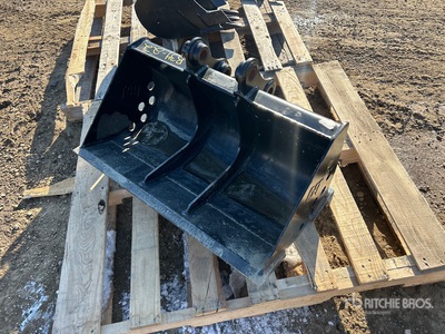 Cat 32 in Cleanup Excavator Bucket