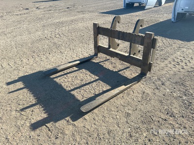 Cat 39 in Backhoe Forks