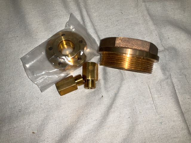 (1) Straight Pipe Adapter, (2) Fittings, (1) Valve Cap & Assorted Items