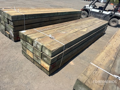 Quantity of 6 in x 10 in x 14 ft Surplus Pressure Treated Lumber