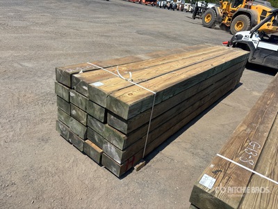 Quantity of 6 in x 10 in x 14 ft Surplus Pressure Treated Lumber