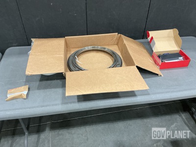 (2) Adapter Housings, (2) Modems, (25) Filter Restrictors & Assorted Items