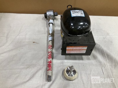 (1) Compressor, (1) Valve Disk, (1) Torque Wrench & Assorted Items