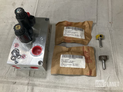 (1) Manifold, (6) Pins, (256) Suspensions Assemblies & Assorted Items