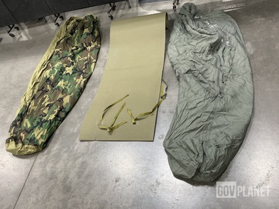 (5) Sleeping Bags, (18) Bivy Covers, (28) Sleeping Mats & Assorted Items