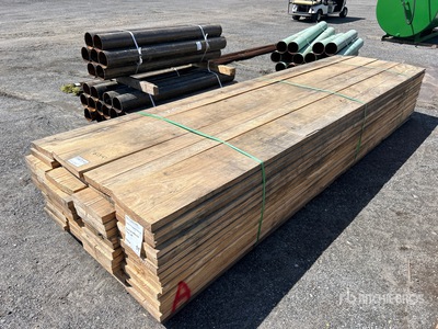 Quantity of (64) 2 in x 12 in x 14 ft Lumber