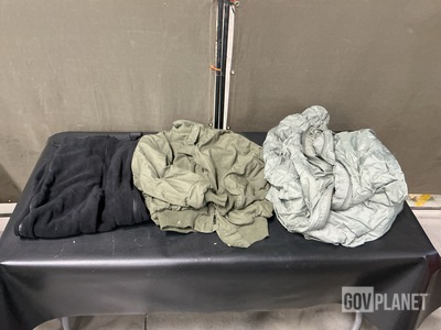 (4) Sleeping Bags, (1) Pair of Cold Weather Overalls & (30) Cold Weather Jackets