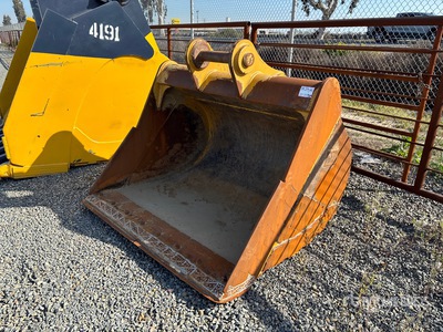 Cat 72 in Excavator Bucket
