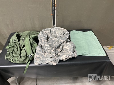 (24) Duffel Bags, (50) Barracks Bags & (1) Pair of Mechanic's Coveralls