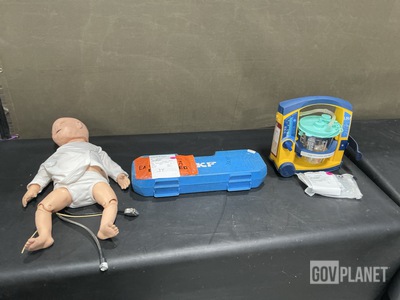 (1) Training Manikin, (1) Oil Check Monitor & Assorted Items
