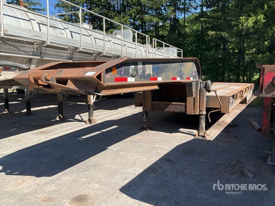 2006 Mcdaniel 65-40D-4 65 ton 40 ft Quad/A Flatbed Oilfield Trailer
