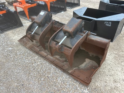 Cat 80 in Skid Steer Grapple Bucket