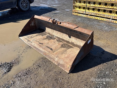 Cat 76 in Skid Steer Bucket