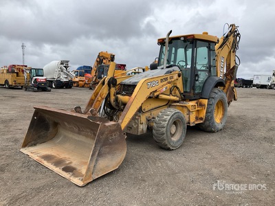 2005 John Deere 710G 4x4 を見 Backhoe Loader