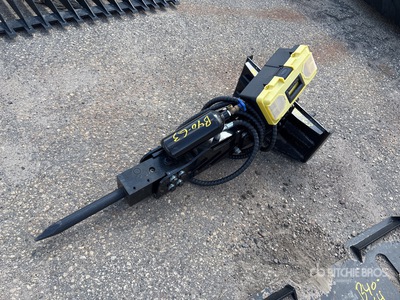 Brise-roche pour chargeuse