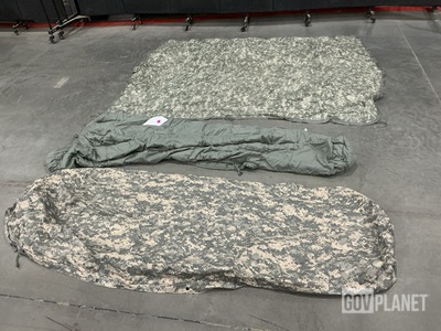 (18) Sleeping Bags, (69) Wet Weather Poncho Liners & Assorted Items