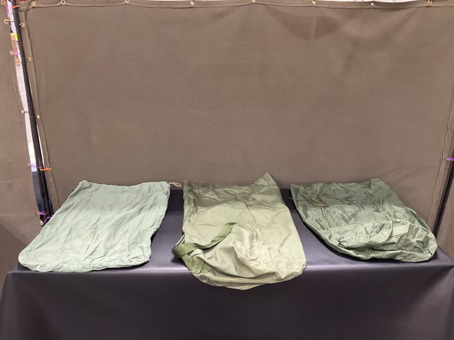 (59) Clothing Bags, (52) Barracks Bags, (14) Duffel Bags & Assorted Items