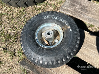Firestone Grain Bagger (1) 4.10/3.50-4 , Firestone (1) 6.90/6.00-9 Tires