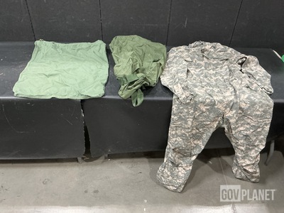 (52) Duffel Bags, (56) Barracks Bags, (2) Pairs of Coveralls & Assorted Items