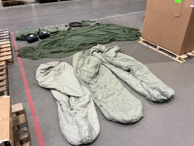 (59) Duffel Bags, (11) Insect Net Protectors, (7) Sleeping Bags & Assorted Items