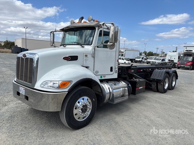 2015 Peterbilt 348 6x4 Roll-Off Truck