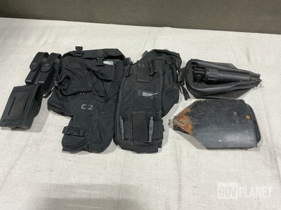 (20) Entrenching Tools, (32) Magazine Pouches, (7) Cases & Assorted Items