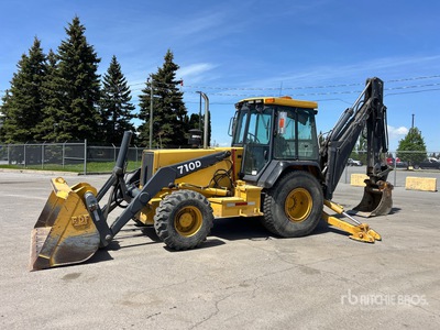 1993 John Deere 710D 4x4 Backhoe Loader