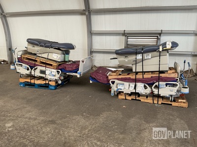 (2) Hill-Rom Hospital Beds & (2) Midmark Examination Tables