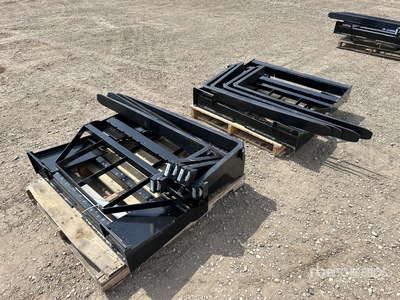 Quantity of (4) 48 in Skid Steer Forks (Unused)