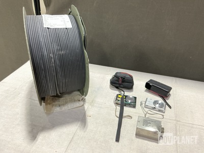 (1) Spool of Cable, (14) Digital Cameras, (1) Light Lens & Assorted Items