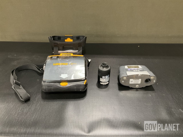 (3) Calibrators, (1) Spirometer, (1) Defibrillator & Assorted Items