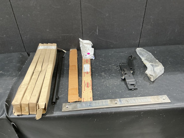 (4) Boom Wear Pads, (4) Metal Conduits & Assorted Items