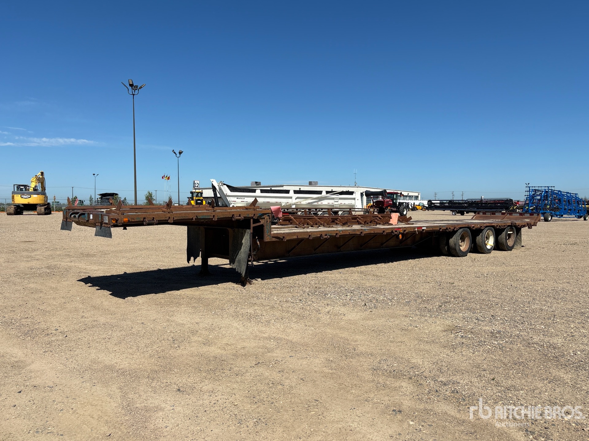 1989 Trail-Eze 51 ft Tri/A Bale Step Deck Trailer