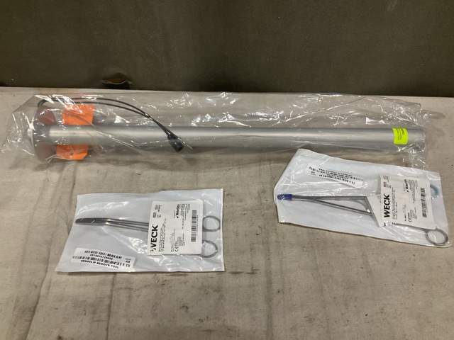 (1) Liquid Transmitter, (6) Clip Appliers & Assorted Items
