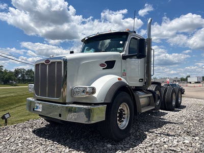 2023 Peterbilt 567 8x4 Tri/A Day Cab Truck Tractor