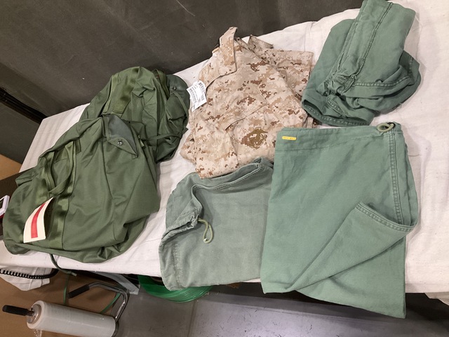 (21) Marpat Blouses, (56) Barracks Bags, (23) Flyer’s Kit Bags & Assorted Items (21) Marpat Blouses, (56) Barracks Bags, (23) Flyer’s Kit Bags & Assorted Items