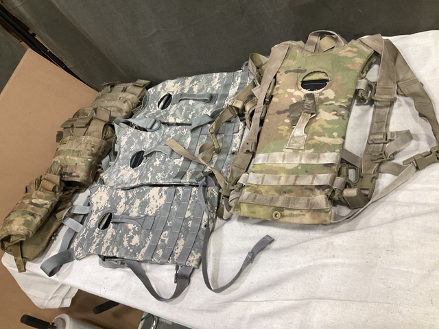 (53) Hydration Carriers, (20) Tactical Assault Panels & Assorted Items