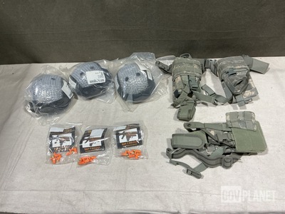 (26) Holsters, (7) Saf-T-Rounds, (5) Helmet Liners & Assorted Items