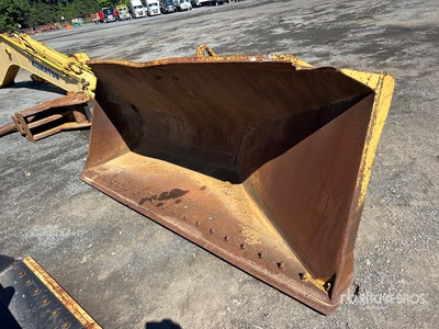 124 in Side Dump Wiellader bakken
