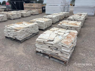 Quantity of (10) Pallets of Austin White Sunflower Limestone 4 - 8 In. Chopped Veneer Kamień