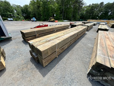 Quantity of (6)  12 in x 12 in x 20 ft Pressure Treated Legname
