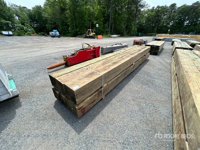 Quantity of (6)  12 in x 12 in x 18 ft Pressure Treated Legname