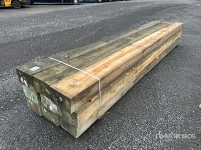 Quantity of (9) Surplus Pressure Treated Lumber 8 in x 12 in x 16 ft Lumber